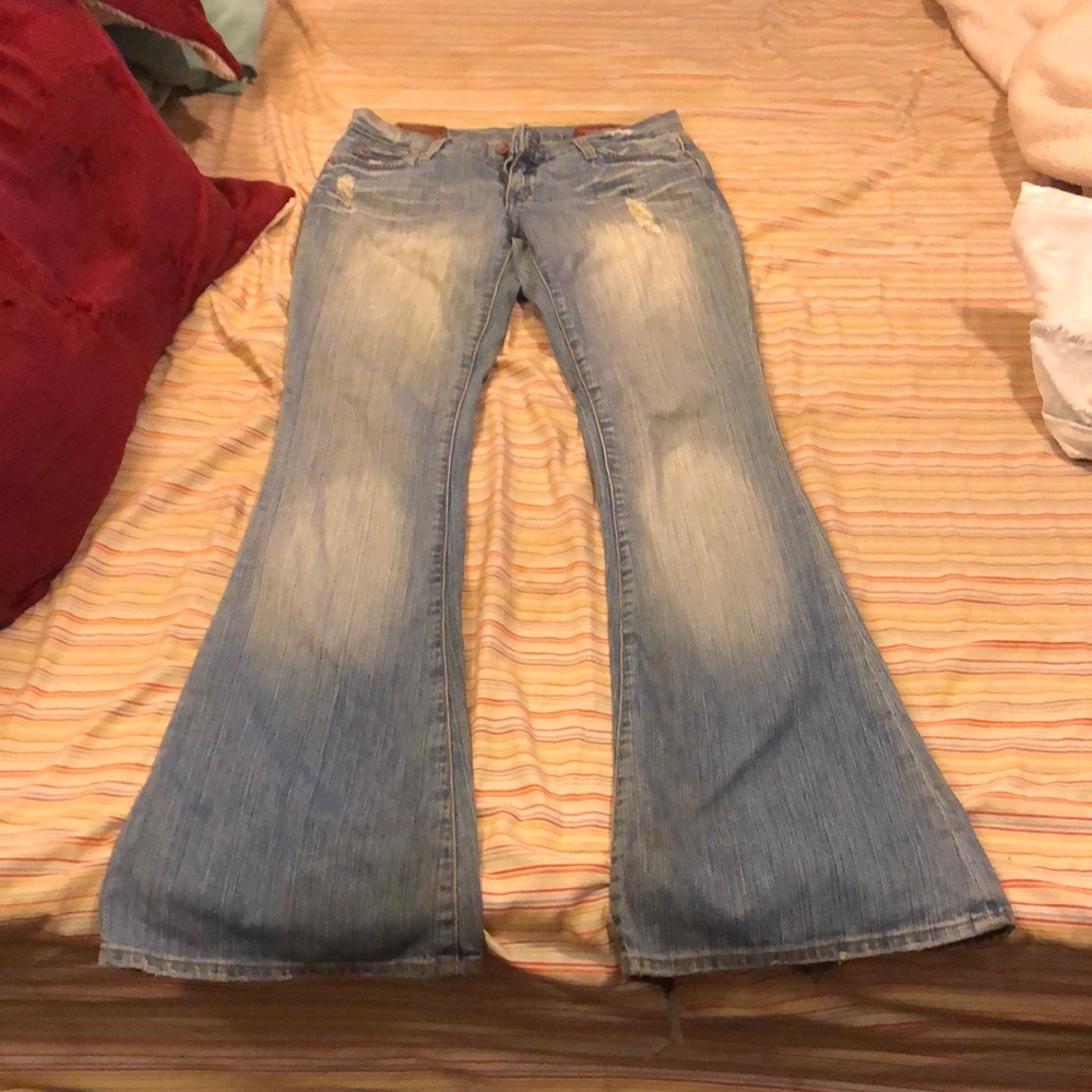 Light wash blue boot cut jeans